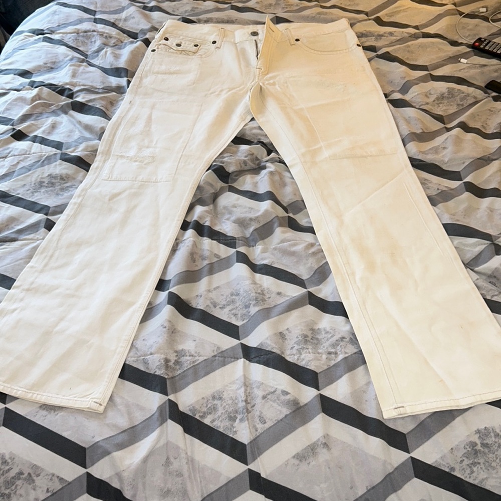 All white men’s, true legend, jeans, distressed size 38 in excellent condition
